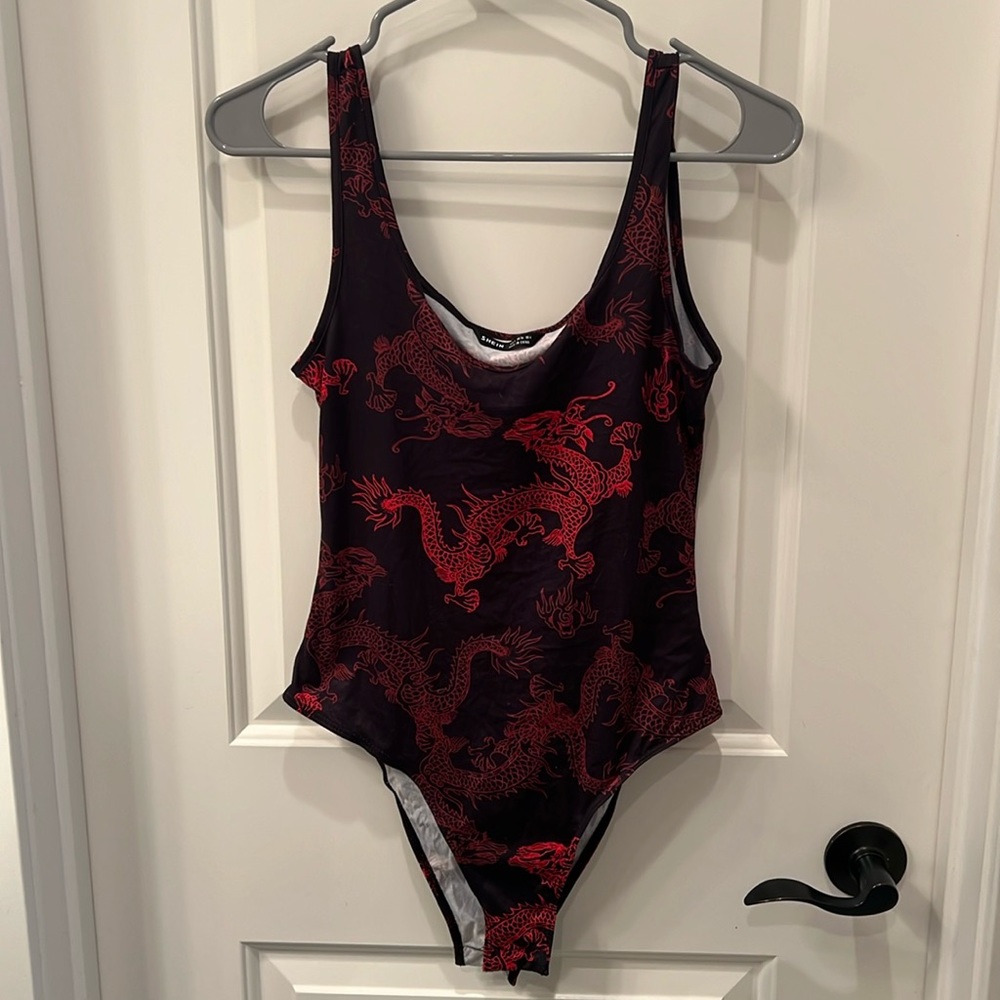 Black bodysuit with red dragons size 4